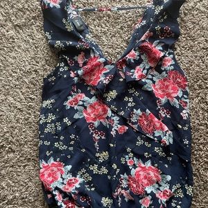 Short sleeve partially open back woman’s shirt